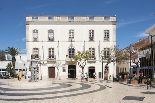 LAGOS,PORTUGAL-APRIL20, 2015: people shopping and looking at monuments in Lagos on April 19 2015,Lagos is the most southern big city of the Algarve Area in Portugal