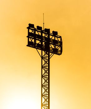 black silhouette of spotlight tower