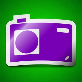 Photo camera icon sign. Symbol chic colored sticky label on green background.  illustration