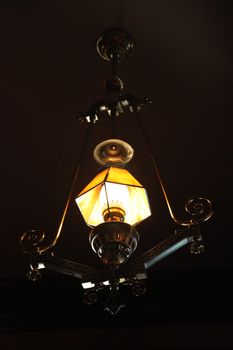 A vintage light hanging from the ceiling