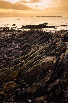 Rock and sea morning  light in Thailand