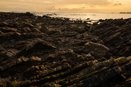 Rock and sea morning  light in Thailand