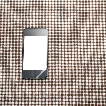 smart phone on kitchen towel background