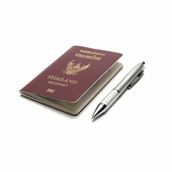 passport and pen isolated on white background
