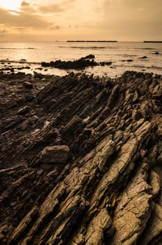 Rock and sea morning  light in Thailand