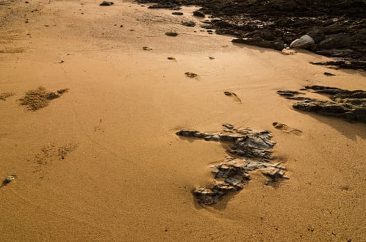 footprints and sea morning  light in Thailand