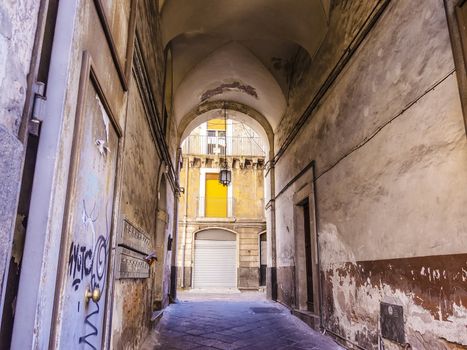 Narrow street in Catania city - Sicily, Italy