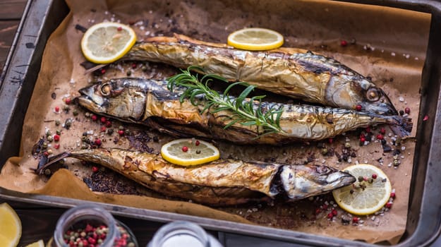 Baked Whole Fish with Spice, Lemon and Rosemary on a Roaster Pan with Baking Paper