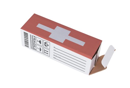 Concept of export, opened paper box - Product of Switzerland