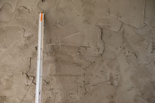 Masons are building walls plastered smooth.