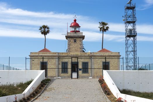 lighthouse on the rocks from Lagos in Portugal
