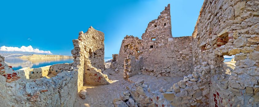 Old fortress ruins on Pag island and bridge panoramic view, Dalmatia, Croatia