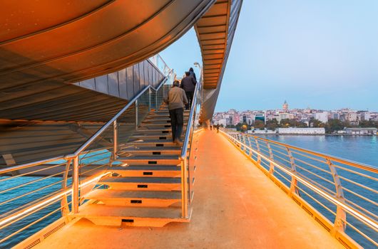 The New Galata Bridge and Istanbul night cityscape.