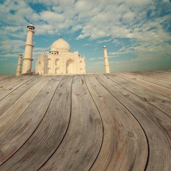 Taj Mahal India Sunset view from wooden platform.