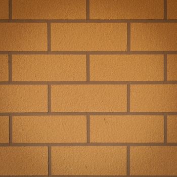 Brown brick wall. A square brick tile wall.