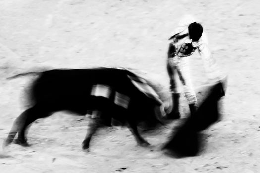 Bullfigting in bullring Las Ventas, Madrid, Spain. Artistic abstract black and white image.