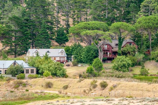 CAPE TOWN, SOUTH AFRICA - DECEMBER 22, 2014: Rustic houses on Wedderville Estate near Sir Lowrys Pass