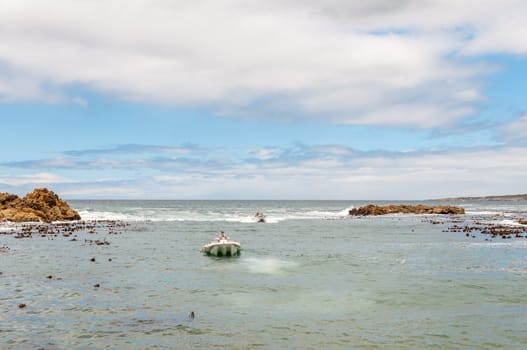 KLEINMOND, SOUTH AFRICA - DECEMBER 23, 2014: Crayfish boats arriving at the harbor to be pulled out of the water