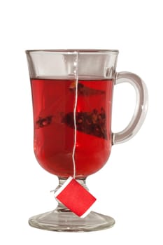 fruit tea in a transparent glass cup on a white background