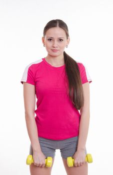 Young beautiful girl holds Europeans physical exercise
