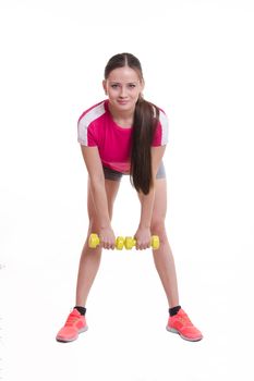 Young beautiful girl holds Europeans physical exercise