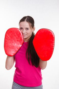Young beautiful girl holds Europeans physical exercise