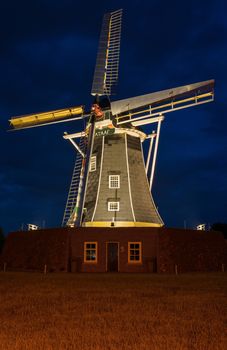 Authentic renovated windmill in Winterswijk in the east of the Netherlands in special illumination
