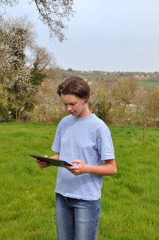 Girl using digital tablet