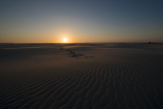 Sunset on the North Sea Beach of the island Terschelling in the Netherlands