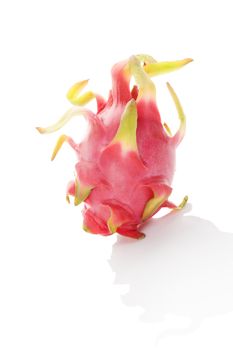 Whole dragon fruit isolated on white background. Tropical fruits concept.