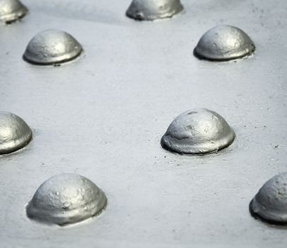 abstract background or texture Grey steel rivets