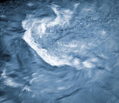abstract background or texture blue twisting the ice water