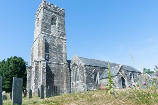 Historic English stone church in Cornish countryside.