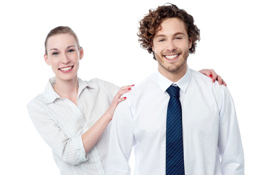 Smiling woman posing behind her colleague