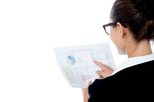 Business woman analyzing business reports