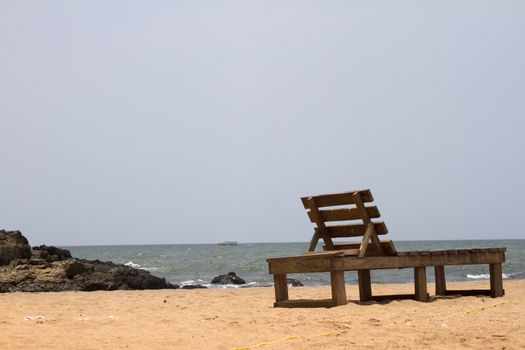 Plank bed  on a beach. India Goa