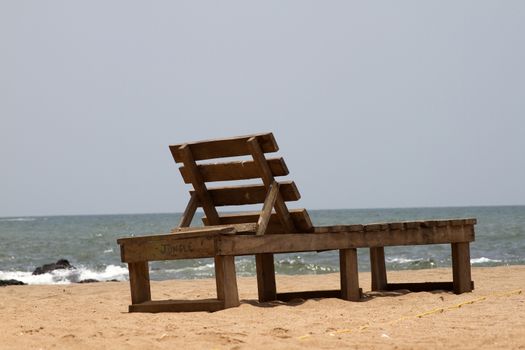 Plank bed  on a beach. India Goa