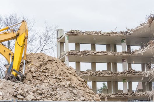 Excavators demolition cutter for crushing of concrete.