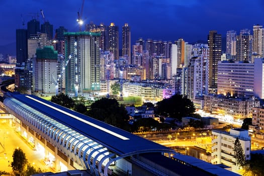 Long Ping, hong kong urban downtown and high speed train at night