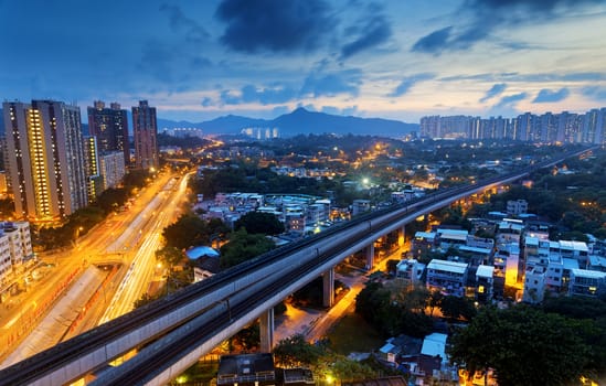 Long Ping, hong kong urban downtown and high speed train at night