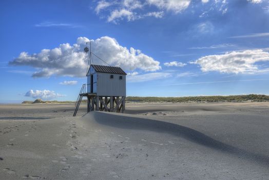 Beach hut on the island of Terschelling in the Netherlands. Authentic wooden beach hut, for shelter, on the island of Terschelling in the Netherlands.