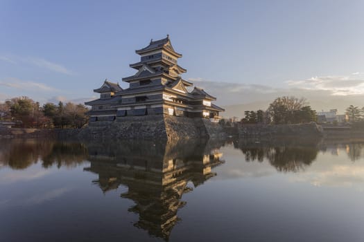 This photo was shot from Matsumoto Castle, Japan in early morning. The soft sunlight touch the castle is so beautiful.