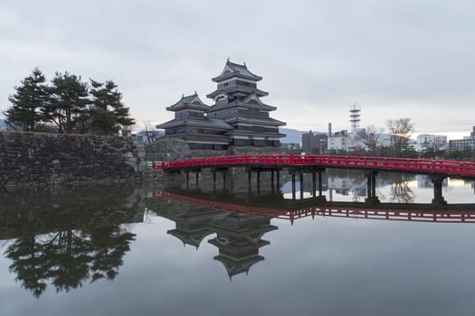 This photo was shot from Matsumoto Castle, Japan in early morning. The soft sunlight touch the castle is so beautiful.
