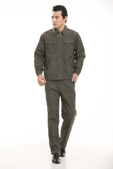 The young engineer various occupation clothing standing in front of a white background