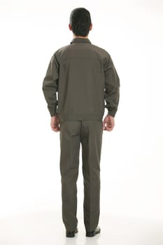 The young engineer various occupation clothing standing in front of a white background