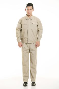 The young engineer various occupation clothing standing in front of a white background