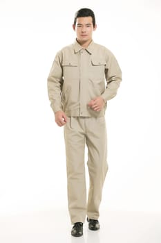 The young engineer various occupation clothing standing in front of a white background