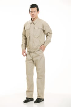 The young engineer various occupation clothing standing in front of a white background