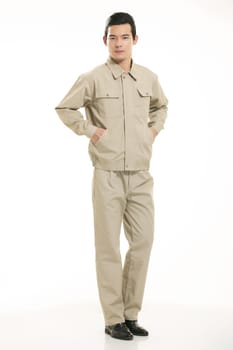 The young engineer various occupation clothing standing in front of a white background