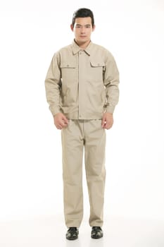 The young engineer various occupation clothing standing in front of a white background